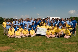 Volunteers with KEEN sign